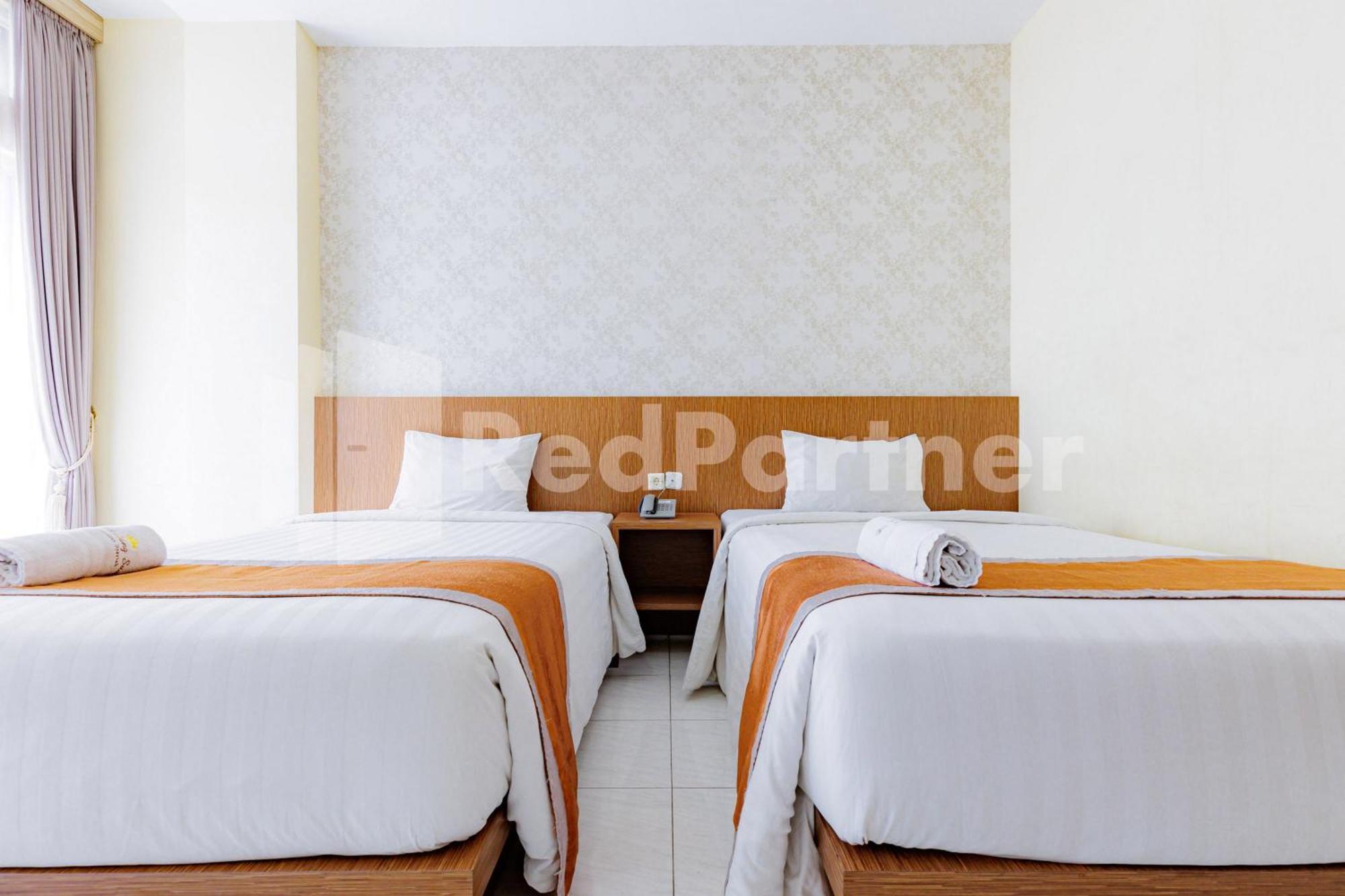 De Malang Sweet Homestay Syariah Mitra Reddoorz Zewnętrze zdjęcie